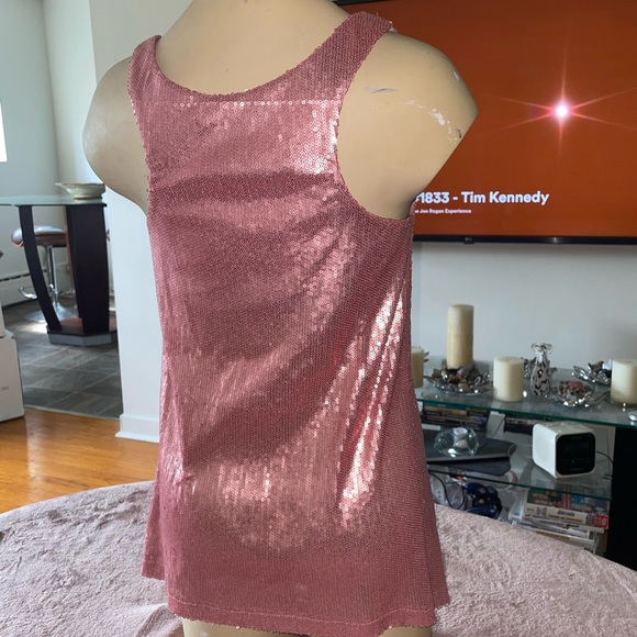 Shiny babydoll shirt. Stunning with a pair of heels and jeans. - Picture 3 of 15